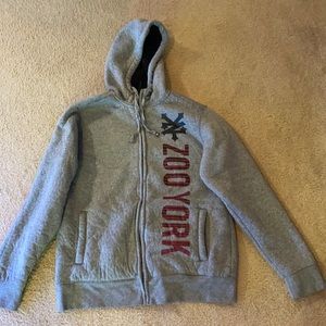 This is a Zoo York Gray Zip up jacket. Very soft!